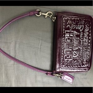 Metallic purple & silver coach wristlet